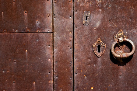 An ancient iron door texture with a lot of rust