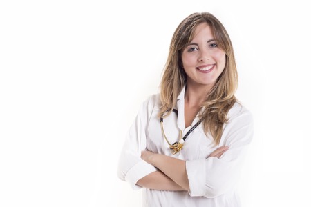 Smiling beautiful blond woman doctor with stethoscope isolated on white backgroundの写真素材