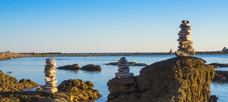 Stone beach in Zabratija at the sunset, Umag, Croatiaの写真素材