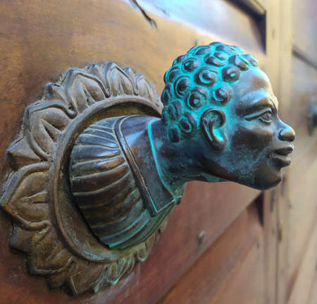 Detail of old medieval door, Parma city, Italy. High quality photo
