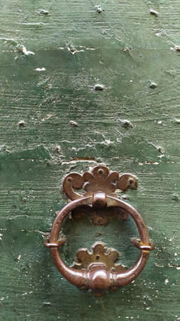 Detail of old medieval door, Parma city, Italy. High quality photo
