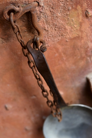 old spoon for drinking water in a mountain village, Mallorca, Spainのeditorial素材