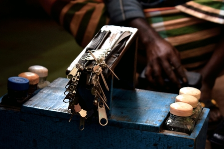 shoemaker on board the ferry, Bangladeshのeditorial素材