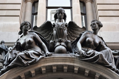 fronton with a sphinx and two women on the streets of London, United Kingdomのeditorial素材