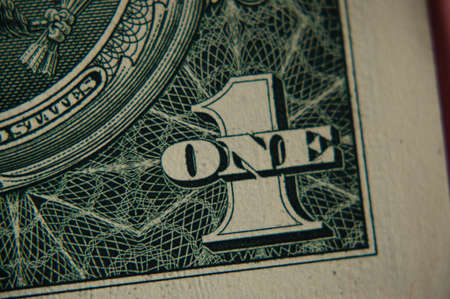 One dollar symbol on a one dollar bill, macro