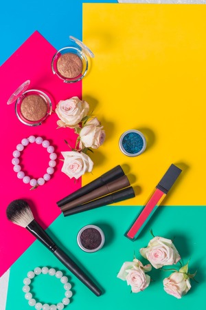 Still life photography, cosmetics to multi-colored bright backgroundの写真素材