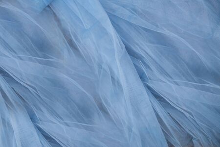 Beautiful delicate blue wedding veil fabric backgroundの写真素材