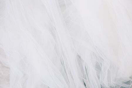 Beautiful delicate white wedding veil fabric backgroundの写真素材