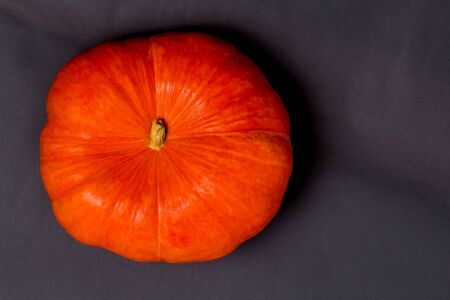 Orange autumn pumpkin on black background, top viewの写真素材