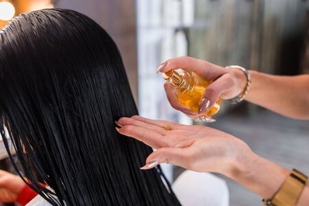 Oil hair treatment for woman. Spa, beauty salon