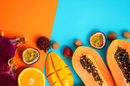Exotic fruits on colored backgroundの写真素材