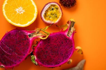 Exotic fruits on colored backgroundの写真素材