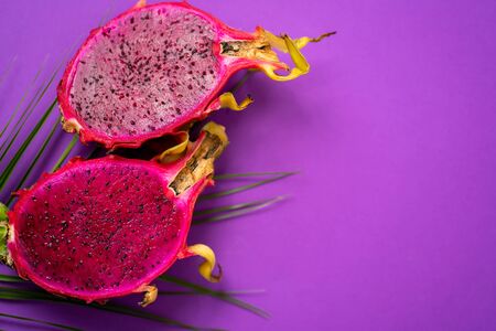 Dragon fruit isolated on violet backgroundの写真素材