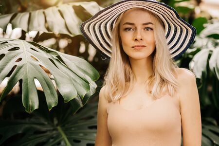 Blonde woman in sun hatの写真素材