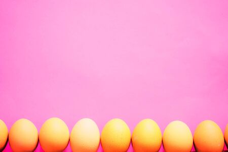 Pastel pink with Easter Eggsの写真素材