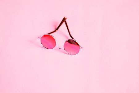 Glasses isolated on pink backgroundの写真素材