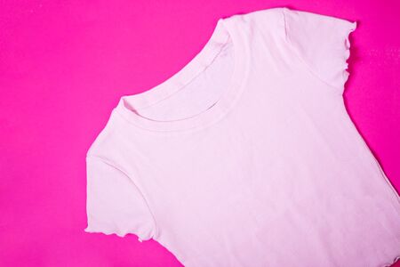 T-shirt on red backgroundの写真素材