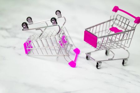 Shopping trolleys on light backgroundの写真素材