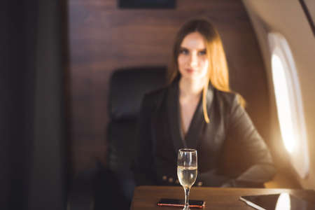 Attractive woman in private jetの写真素材