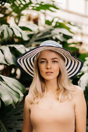 Blonde woman in sun hatの写真素材