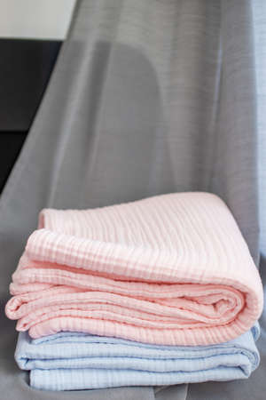 Pressed muslin, blue and pink baby blankets. Fabric, textiles, clothing conceptsの写真素材