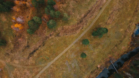 Autumn Colors. Top view of nature. River, forest and fieldの写真素材