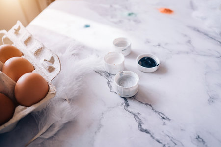 Happy Easter, spring, eggs on the table, paint and brushes