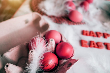 Abstract pink eggs on white fluff close-up. Easter spring conceptの写真素材