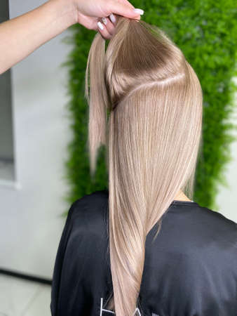beautiful hair. hair coloring. dyed hair in a beauty salon.の写真素材