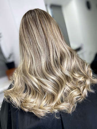 hair. dyed hair. hair coloring. beautiful hair. dyed hair in a beauty salon.の写真素材