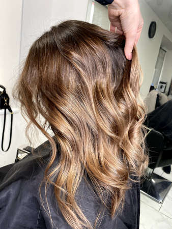 hair. dyed hair. hair coloring. beautiful hair. dyed hair in a beauty salon.の写真素材
