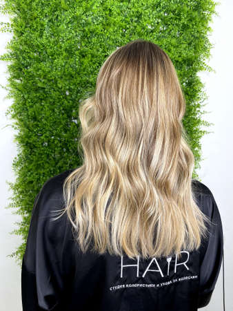 hair. dyed hair. hair coloring. beautiful hair. dyed hair in a beauty salon.の写真素材