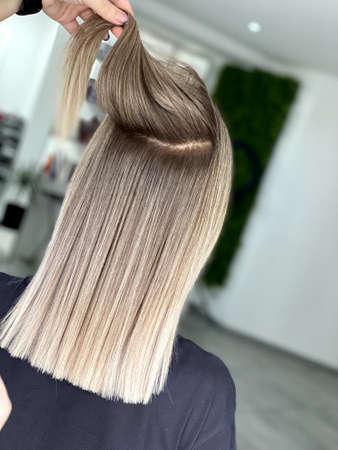 hair. dyed hair. hair coloring. beautiful hair. dyed hair in a beauty salon.の写真素材