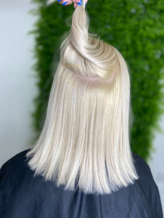 hair. dyed hair. hair coloring. beautiful hair. dyed hair in a beauty salon.の写真素材