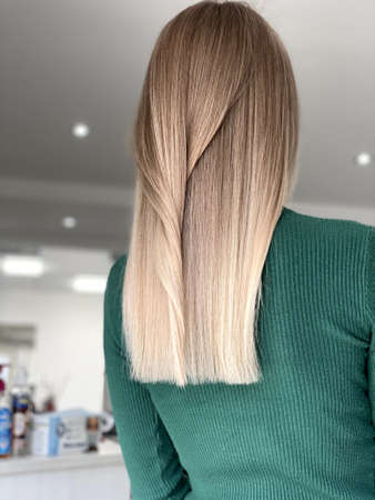 hair. dyed hair. hair coloring. beautiful hair. dyed hair in a beauty salon.の写真素材