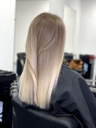 hair. dyed hair. hair coloring. beautiful hair. dyed hair in a beauty salon.の写真素材