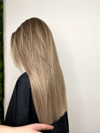 hair. dyed hair. hair coloring. beautiful hair. dyed hair in a beauty salon.の写真素材