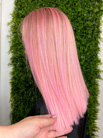 hair. dyed hair. hair coloring. beautiful hair. dyed hair in a beauty salon.の写真素材
