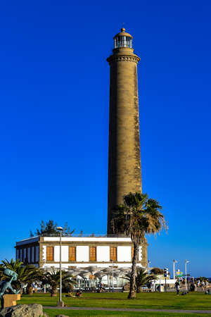 The Maspalomas lighthouse is active 19 th century lighthouse at the southern end of the spanish island of gran canaria. Has been declared a property of cultural interest in 2005.の写真素材