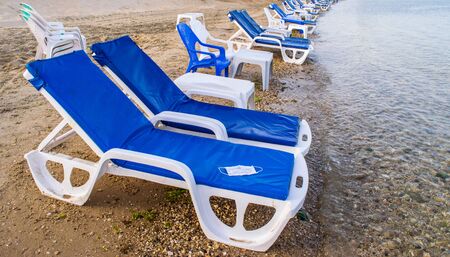 Empty sunbeds on the seashoreの写真素材