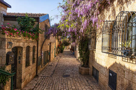 Jerusalem, Israel - June 12, 2021: Old houses in Yemin Moshe district, Jerusalem, Israel.