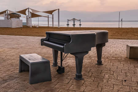 A piano on the coast of the Ein Bokek, Dead Sea, Israel.の写真素材
