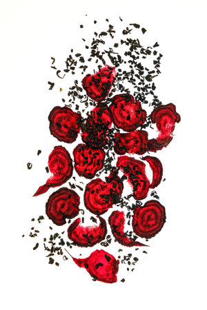 Abstract view from fresh beet scraps and loose tea.の写真素材