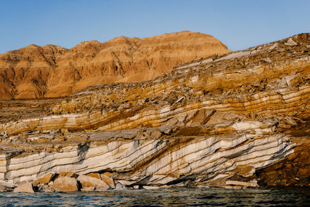 Dead Sea coast with stones covered by salt.