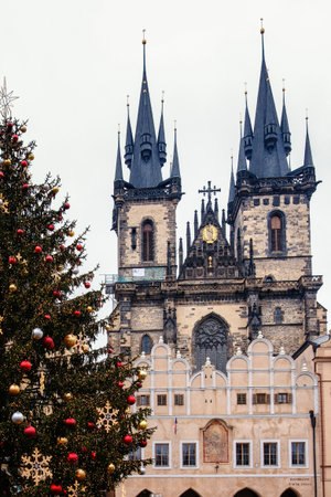 Prague, Czechia - December 20, 2024: Gothic Church of Our Lady before Tyn and Christmas Tree in Prague Old Town.の写真素材