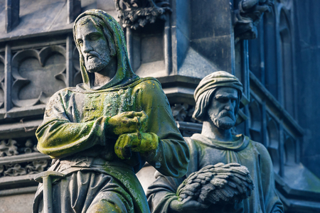 Sculptures of peasants at work decorate monument in Prague, Czech Republic.の写真素材