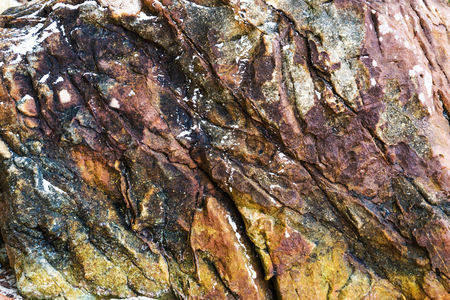 Texture for design with stone rock with cracks.