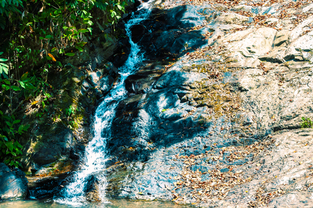 Waterfall in jungle in Asia on Langkawi island, Malaysia.の写真素材