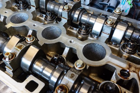 Camshafts and valve in oil on the car engine, Service and repair of car
