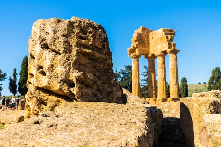 Ruins of Greek Temple of Castor and Pollux in Valley of the Temples in Agrigento, Sicily.の写真素材